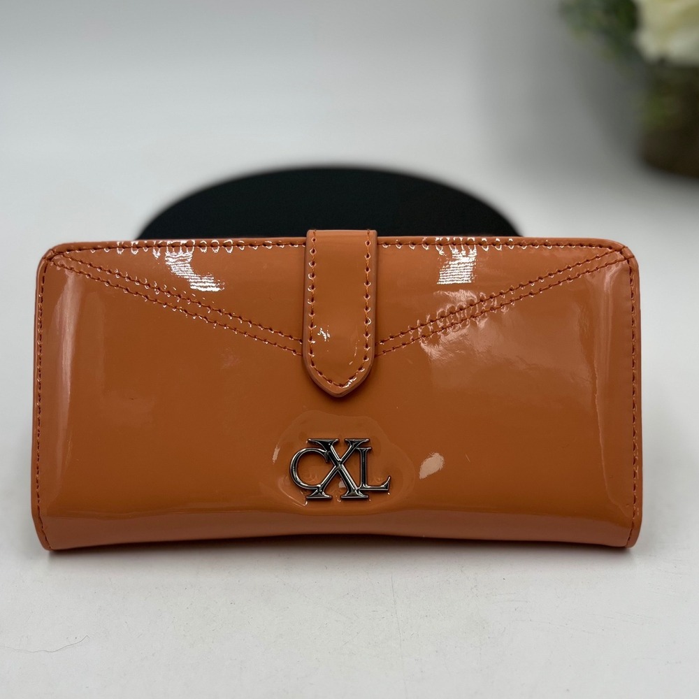Christian Lacroix Metro Patent
Bi Fold Skinny Wallet, Color Tango Brand New